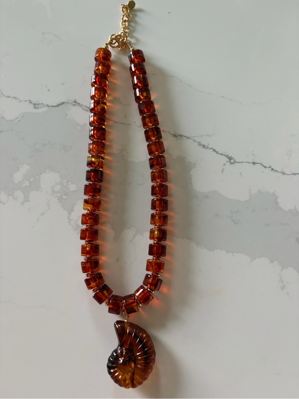 Anthropologie Amber Brown Beaded Necklace with Nautilus Pendant